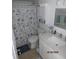Clean bathroom featuring a well-lit vanity, ample storage, and modern fixtures at 1 Quails Run Blvd # 2, Englewood, FL 34223