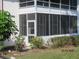 A screened porch provides an ideal space to enjoy the outdoors while remaining protected from the elements at 1 Quails Run Blvd # 2, Englewood, FL 34223