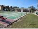 Well-maintained shuffleboard courts offering a recreational space for residents and guests at 1 Quails Run Blvd # 2, Englewood, FL 34223