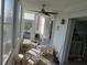 Relaxing sunroom with plenty of light and seating provides great views of the community at 1 Quails Run Blvd # 2, Englewood, FL 34223