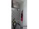 The utility closet is efficiently designed with all the necessary equipment neatly stored at 1 Quails Run Blvd # 2, Englewood, FL 34223