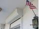 Exterior view of the property's hurricane shutters at 1 Quails Run Blvd # 2, Englewood, FL 34223