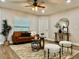 Cozy living room with modern furnishings and a comfortable seating arrangement at 10118 66Th Ave, Seminole, FL 33772