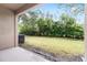 Enjoy a private backyard with lush greenery, perfect for relaxing and entertaining guests outdoors at 1034 Grantham Dr, Sarasota, FL 34234