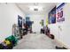Spacious garage with ample storage, shelving, and sports memorabilia for car enthusiasts and hobbyists at 1034 Grantham Dr, Sarasota, FL 34234
