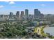 A captivating city view showcases the skyline with towering buildings, lush greenery, and tranquil waters at 1118 S Moody Ave, Tampa, FL 33629
