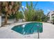 A community pool with a concrete deck offers a refreshing escape with clear water and easy access at 1118 S Moody Ave, Tampa, FL 33629