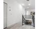 Hallway with iron railing and wood flooring at 1118 S Moody Ave, Tampa, FL 33629