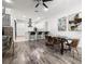 Open concept living room and kitchen with dining room table and chairs at 1118 S Moody Ave, Tampa, FL 33629