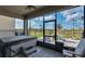 This screened-in patio features an oversized hot tub, a tile floor, and outdoor views at 12515 Horseshoe Bend Dr, Lithia, FL 33547
