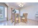 This well-lit dining room offers a view to the back yard at 1655 S Highland Ave # B110, Clearwater, FL 33756