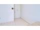 Inviting foyer featuring tiled flooring and a secure front door at 1655 S Highland Ave # B110, Clearwater, FL 33756