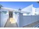 Inviting walkway to the front entrance, accentuated by a stylish lamp post and well-maintained exterior at 1655 S Highland Ave # B110, Clearwater, FL 33756
