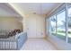 This sun room has tile floors and lots of windows at 1655 S Highland Ave # B110, Clearwater, FL 33756
