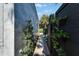 Backyard featuring modern hardscaping, privacy fence and accessory building at 3106 Lila St, Tampa, FL 33610
