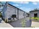 Backyard view, with marble building, paved area, and small storage shed at 3106 Lila St, Tampa, FL 33610