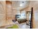 Unique bedroom with a modern hanging desk, chic decor, and view from the window at 3106 Lila St, Tampa, FL 33610