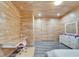 Bedroom with sleek wood walls, suspended desk, and ample space at 3106 Lila St, Tampa, FL 33610