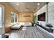 Sun-drenched living area with an oversized window, white sofa and trendy decor at 3106 Lila St, Tampa, FL 33610