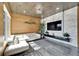 Living area showcasing a plush white sofa, modern lighting, and stylish decor at 3106 Lila St, Tampa, FL 33610