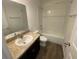 Clean bathroom with a vanity, toilet, and shower/tub combination at 35220 White Water Lily Way, Zephyrhills, FL 33541