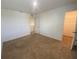 Spacious bedroom with carpet, natural light and a walk-in closet at 35220 White Water Lily Way, Zephyrhills, FL 33541