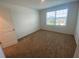 Comfortable bedroom with carpet, natural light and a window at 35220 White Water Lily Way, Zephyrhills, FL 33541