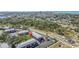 The aerial view of the property reveals a well-maintained community surrounded by lush greenery at 3824 37Th S St # 65, St Petersburg, FL 33711