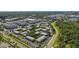 Aerial view of community highlighting location near amenities, green spaces, and convenient roadways at 3824 37Th S St # 65, St Petersburg, FL 33711
