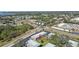An aerial view of the property shows its proximity to residential areas and a body of water at 3824 37Th S St # 65, St Petersburg, FL 33711