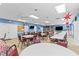 Spacious community room with tables, chairs, and ample lighting for gatherings and events at 3824 37Th S St # 65, St Petersburg, FL 33711