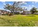 Well-maintained complex with lush green lawn surrounded by mature trees and landscaping at 3824 37Th S St # 65, St Petersburg, FL 33711