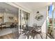 Comfortable, covered patio with furniture flows to light-filled interior through sliding glass doors at 3824 37Th S St # 65, St Petersburg, FL 33711