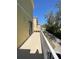 Open air balcony is spacious with a secure railing at 415 Bayou Village Dr, Tarpon Springs, FL 34689