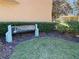 Well manicured entryway and community sign at Bayou Village at 415 Bayou Village Dr, Tarpon Springs, FL 34689