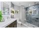 Beautiful bathroom with a walk-in shower and modern fixtures at 4951 Bacopa S Ln # 103, St Petersburg, FL 33715