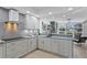 Modern kitchen featuring sleek countertops, cabinetry and stainless steel appliances at 4951 Bacopa S Ln # 103, St Petersburg, FL 33715
