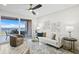 Comfortable living room with a contemporary design, sliding glass doors to the patio, and an open floor plan at 4951 Bacopa S Ln # 103, St Petersburg, FL 33715