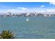 Scenic view of the water featuring sailboats and waterfront buildings in the distance at 4951 Bacopa S Ln # 103, St Petersburg, FL 33715