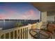 Enjoy this waterfront view from the balcony with a table and chairs for relaxing and entertaining at 500 Treasure Island Cswy # 308, Treasure Island, FL 33706