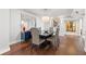 Stylish dining area featuring chic lighting, elegant decor, and wood floors, perfect for entertaining guests at 500 Treasure Island Cswy # 308, Treasure Island, FL 33706