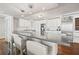 Bright kitchen featuring a spacious island, stainless appliances, and ample counter space for cooking at 500 Treasure Island Cswy # 308, Treasure Island, FL 33706
