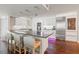 Gourmet kitchen with stainless steel appliances, sleek countertops, and stylish island seating at 500 Treasure Island Cswy # 308, Treasure Island, FL 33706