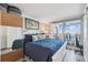 Spacious bedroom with balcony access, offering stunning water views at 5915 Sea Ranch Dr # 703, Hudson, FL 34667