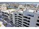 Stunning exterior view of condo building with multiple balconies overlooking a picturesque waterfront community at 5915 Sea Ranch Dr # 703, Hudson, FL 34667