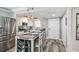 Updated kitchen with stainless appliances and a wine rack island with seating at 5915 Sea Ranch Dr # 703, Hudson, FL 34667