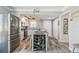 Updated kitchen with stainless appliances and a wine rack island with seating at 5915 Sea Ranch Dr # 703, Hudson, FL 34667