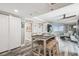 Open-concept living and dining area with stylish furnishings and a view of the water at 5915 Sea Ranch Dr # 703, Hudson, FL 34667