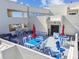 Inviting outdoor patio with seating, dining area, and shade, perfect for relaxing and entertaining at 5915 Sea Ranch Dr # 703, Hudson, FL 34667