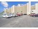 Ample parking available in the parking lot with access to tennis courts and beautiful landscaping at 5915 Sea Ranch Dr # 703, Hudson, FL 34667